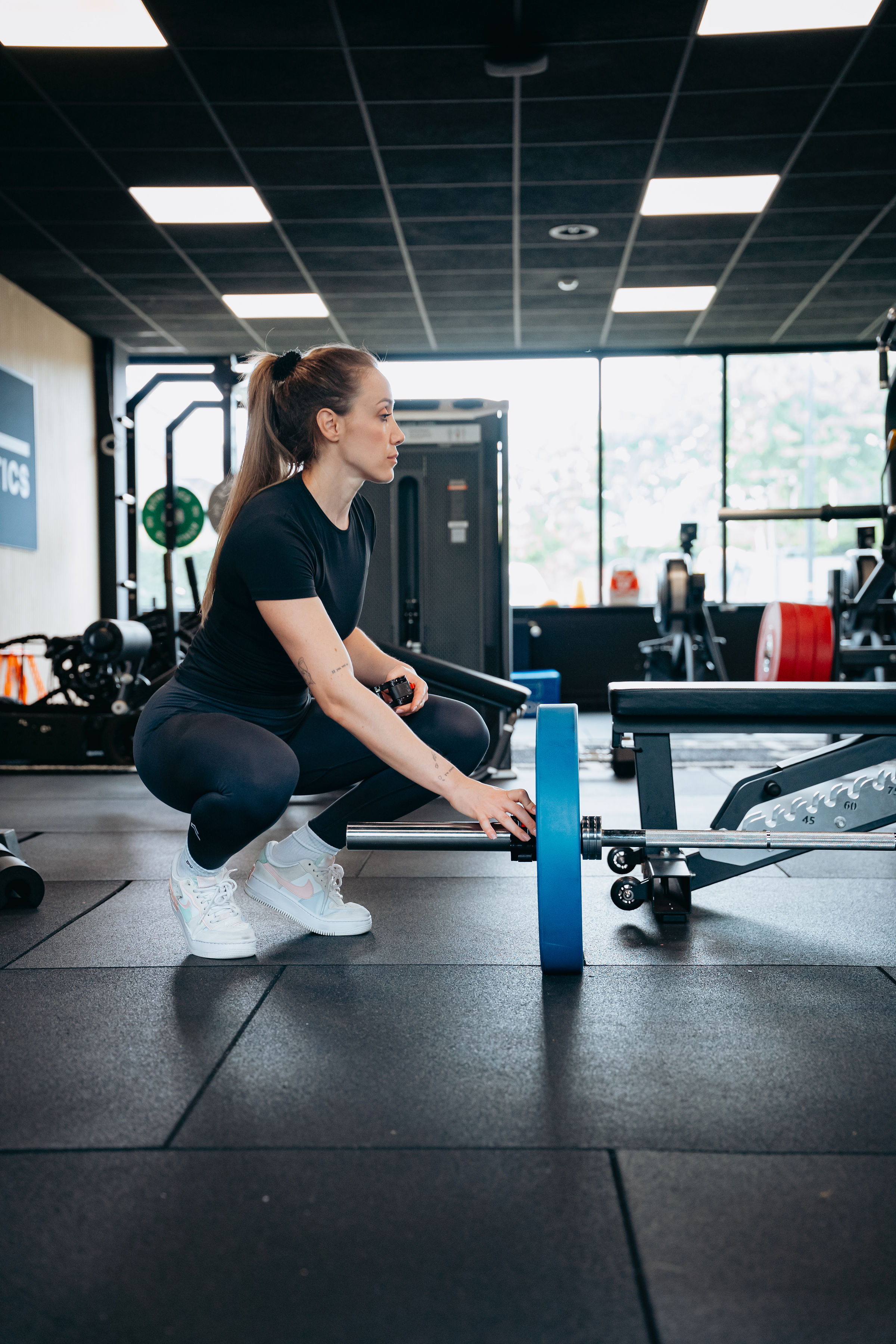 Squat avec barre olympique
